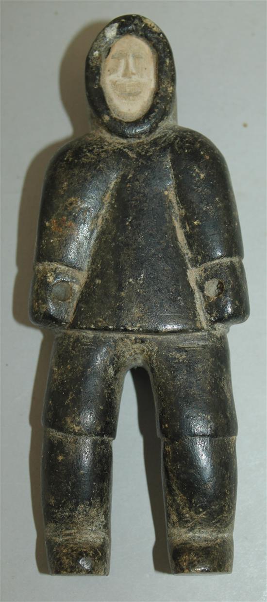 An Inuit carved soapstone figure of a male standing, 5.25in.